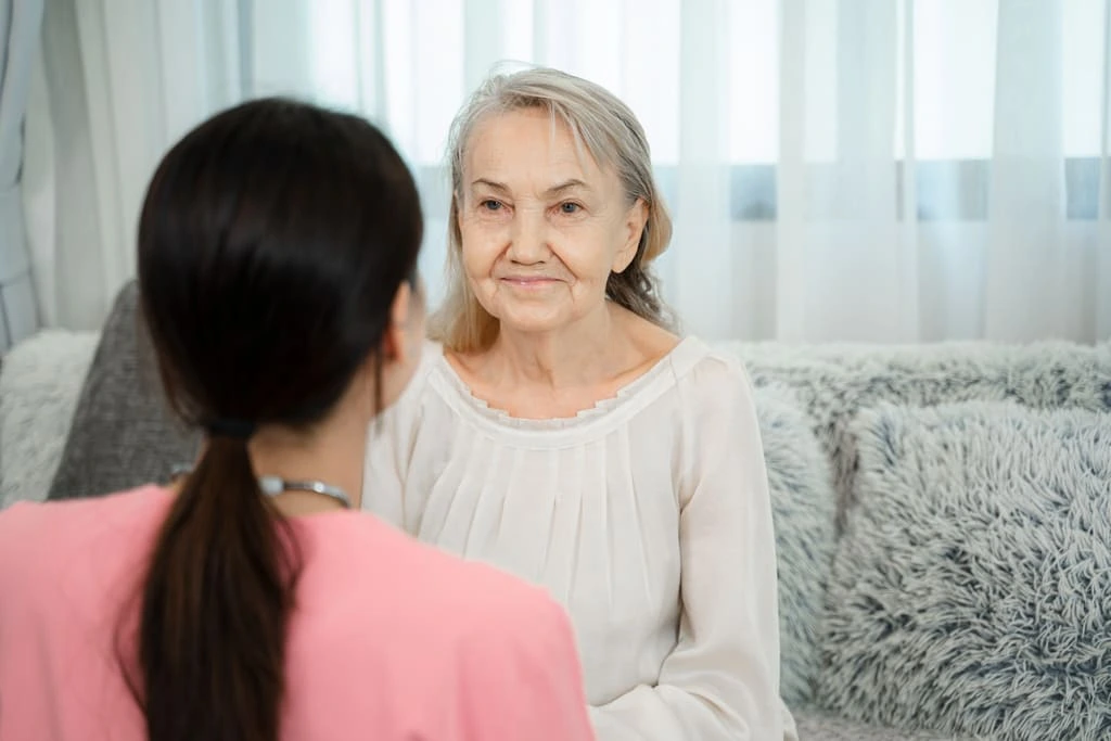 support worker caring for an older lady